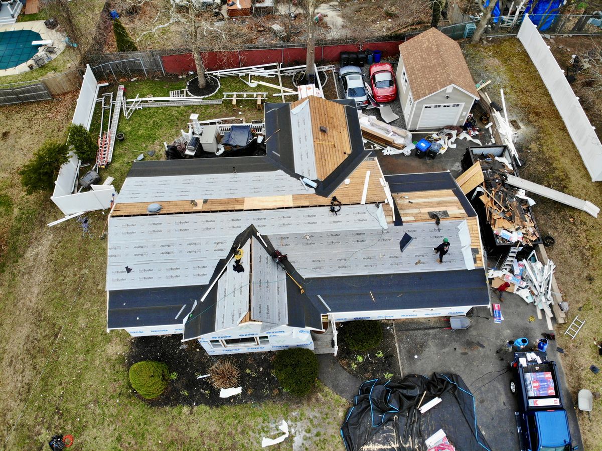 Aerial view of synthetic underlayment installed across a full re-deck